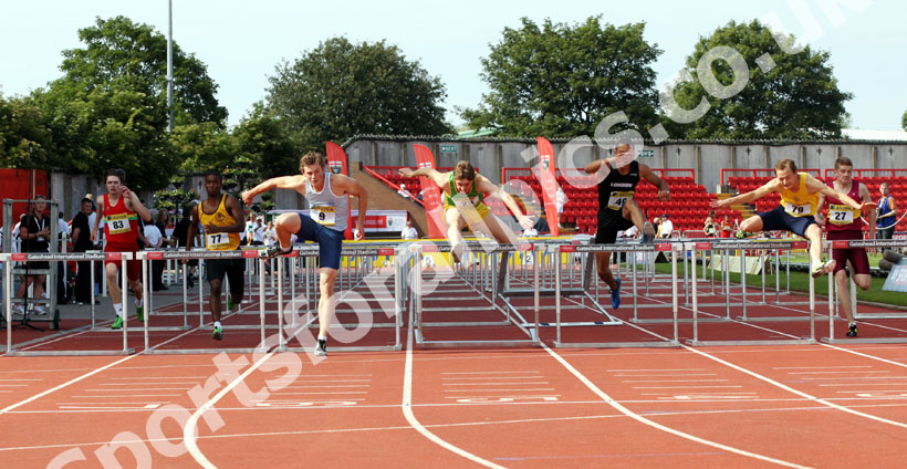 Max Everest (Cambridge) leads over the final hurdle in the 100m inter boys hurdle